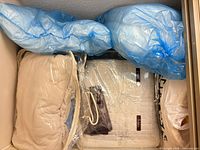 Overview of all bedding items stored on shelf