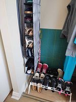 Overview of hanging organizer and floor rack showing multiple shoes