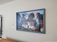 Full view of framed painting on wall