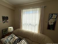 Room view showing all three paintings in situ