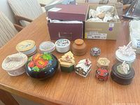 Group shot of all trinket boxes displayed on table