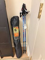 Nordixx poles and Ozark Trail chair bag side by side