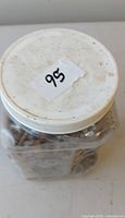 sealed plastic jar with contents visible