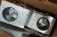 Two recessed can housings inside box