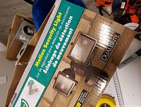 Retail box showing product, brand, DualBrite technology, wattage and detection range