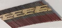 Close view of Paslode paper-collated nail strip