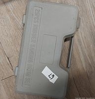 Closed grey case labelled 25PCS RUBBER SANDING DRUM SET