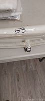 Roller covers, one curved metal bracket and partial coverall package
