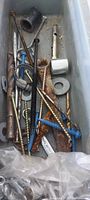 Tray with loose screws, washers, drill bits, socket
