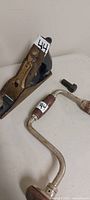 Bench plane, brace drill and small loose bit visible