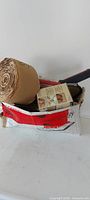 Iron, tape roll, boxed items in lot