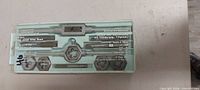 Tap and die set in plastic case showing contents