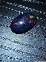Front view of opal showing multicolour flash