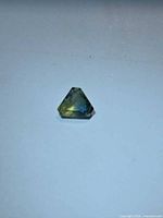 Front view of fancy cut bi-colour sapphire