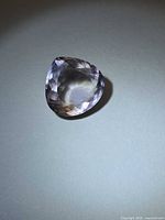 Top view of pear cut amethyst showing overall shape and facets