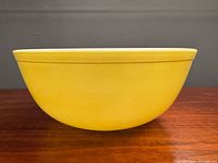 Side view of yellow mixing bowl showing exterior color and shape