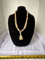 Full view of necklace on display bust