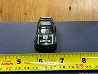 Front view showing Castrol logo, number 7 and overall paint wear