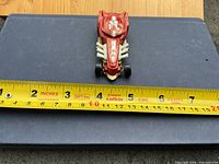 Top view showing overall design, graphics and measurement tape