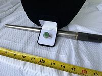 Ring on mandrel showing size and jade top