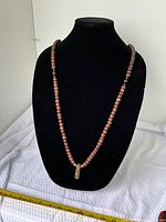 Full view of necklace on bust form
