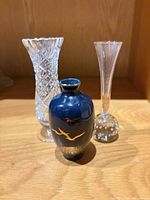 Three vases front view showing design and relative sizes