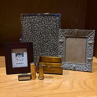 All three frames with two lipstick holders front view