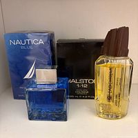 All four fragrances: two boxed and two open bottles