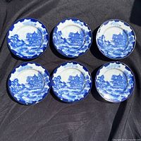 all six small flow blue plates arranged