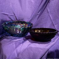 Both glass fruit bowls side by side to show size and color contrast