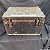 front view showing dual latches, surface wear, stencilled number