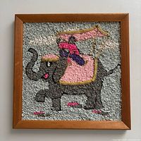 Front view of framed crushed stone wall art