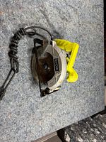 Top view of Ryobi corded circular saw showing blade guard and handle