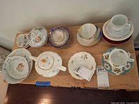 Entire 25-piece china lot displayed on table