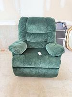 Front view of green microfiber recliner