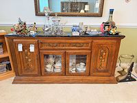 Front view of wood sideboard with contents removed