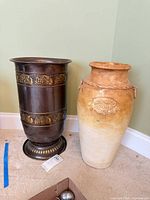 Both vases side by side showing overall design and size