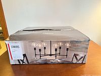 Retail box showing Canvas 6-light chandelier image and branding