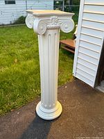 Full view of ivory Ionic resin pedestal column