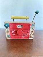 Front view of Fisher-Price wooden toy radio