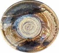 Top view showing variegated glaze and spiral center