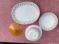 All pieces: oval platter, open bowl, covered bowl base with lid
