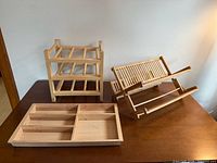 All three items on tabletop: 3-tier rack, collapsible dish rack, cutlery tray