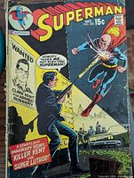 Front cover of Superman issue #230 showing artwork, price, date and wear