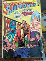 Front cover of Superman No. 228 comic showing title, issue number, month, cover art, and price