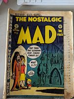Front cover of The Nostalgic MAD No.1 showing title, issue number and wear along edges