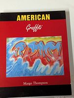 Front cover of American Graffiti hardcover book showing title, author and cover art