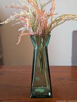 Front view showing complete vase and faux flowers arrangement