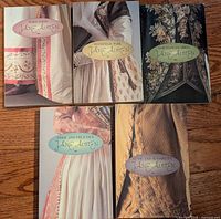 Front covers of five Jane Austen novels in matching series