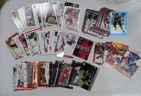 Spread of assorted hockey cards displaying variety of brands and players